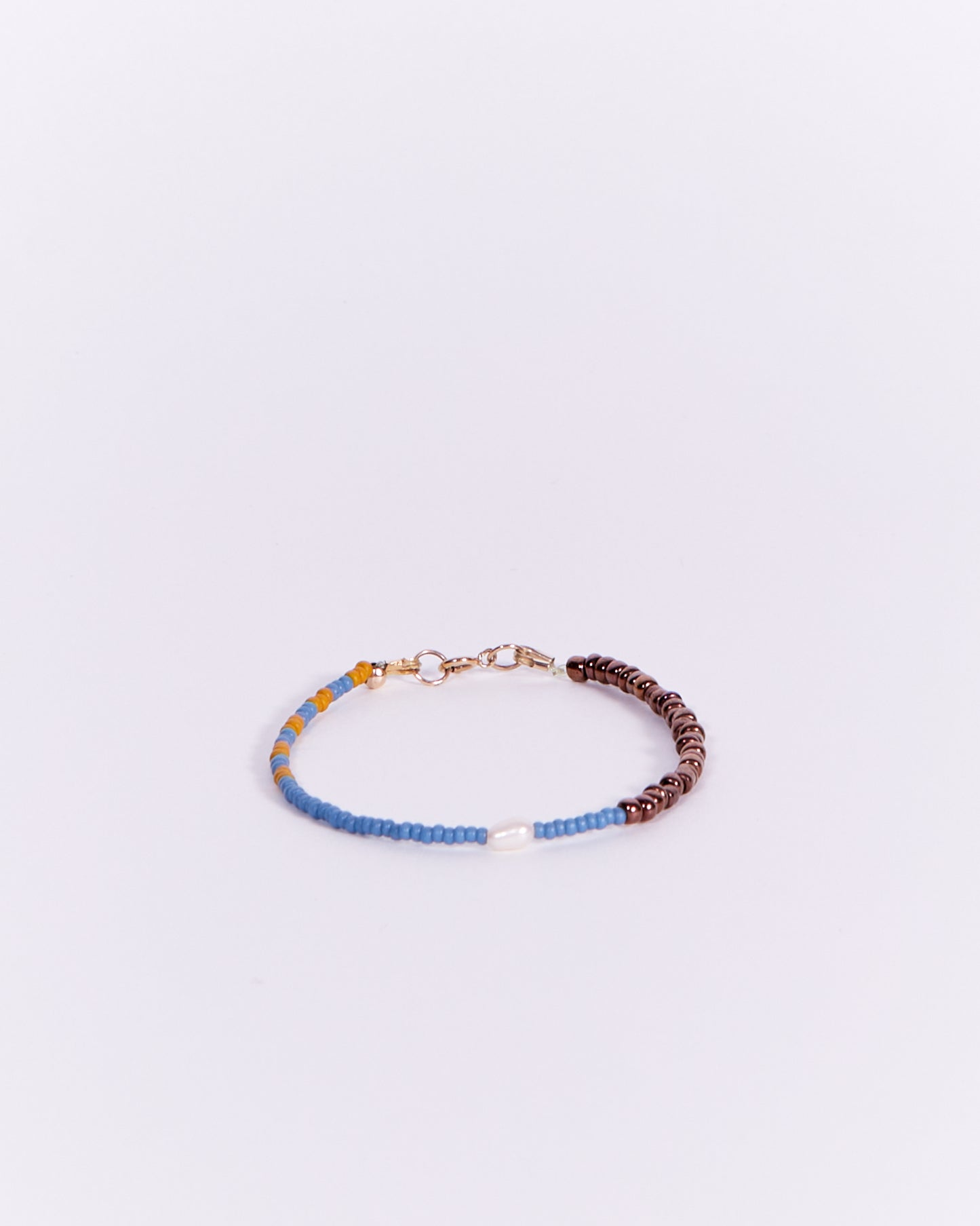 BEADED BRACELET IN BRONZE & BLUE