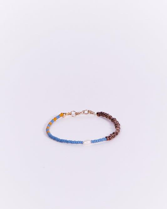 BEADED BRACELET IN BRONZE & BLUE